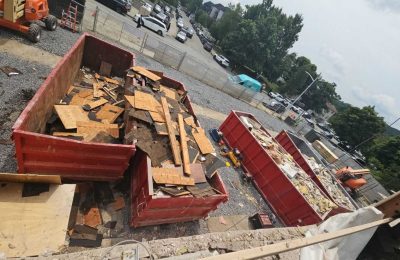 Contractor disposing debris safely