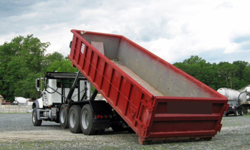 Roll off container with door open: Speedy Dumpsters